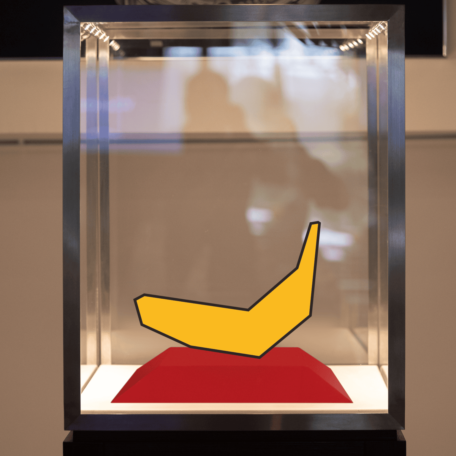 Equifruit Fairtrade banana art installation in modern glass display case highlighting premium brand